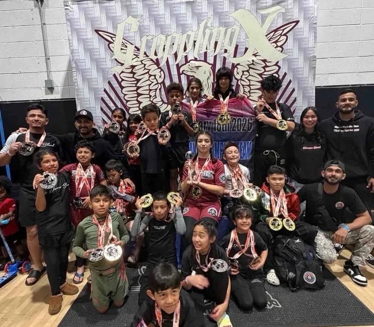 WBJJ team celebrating a competition win